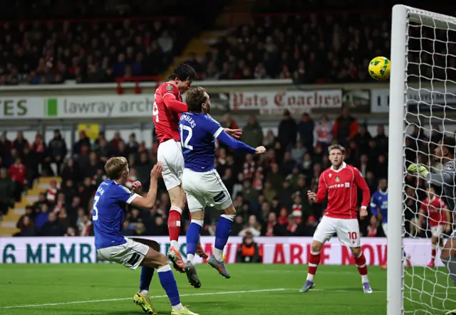 Kieffer Moore of Wrexham scores