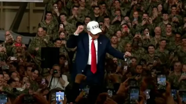 Trump dancing on stage
