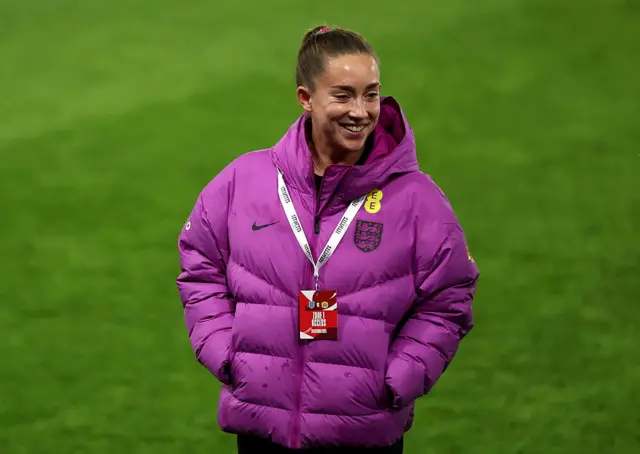 Maya Le Tissier of England inspects the pitch