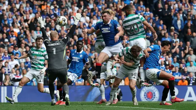John Souttar of Rangers scores his team's goal past Kasper Schmeichel of Celtic