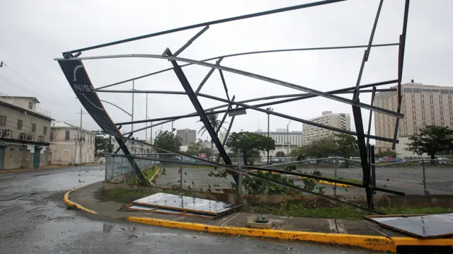 partially collapsed big metal frame