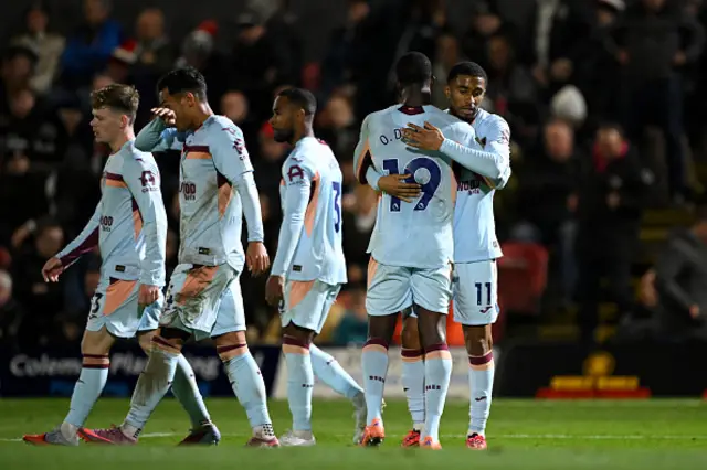 Reiss Nelson of Brentford celebrates with teammate Dango Ouattara
