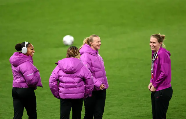 Hannah Hampton of England reacts as she inspects the pitch with teammates prior to the Women's International Friendly match between England and Australia at Pride Park on October 28, 2025 in Derby, England.
