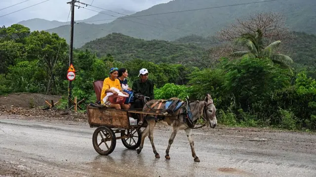 Cubans on a donkey-drawn carriage