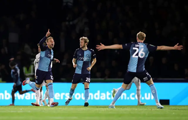 Cauley Woodrow of Wycombe Wanderers celebrates