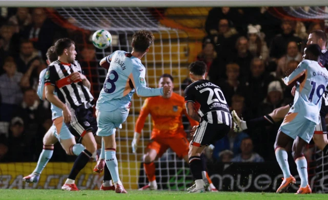 Brentford's Mathias Jensen scores their first goal