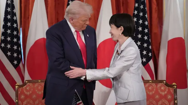 Trump and Takaichi shake hands with each other