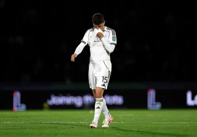 Jorge Cuenca of Fulham looks dejected