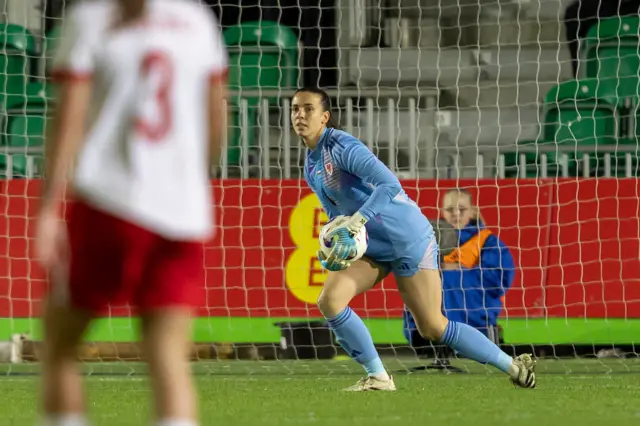 Olivia Clark saves an effort on goal