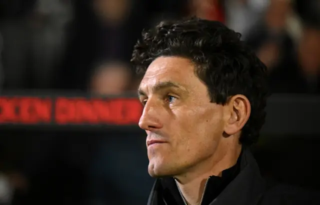 Keith Andrews, Manager of Brentford, looks on
