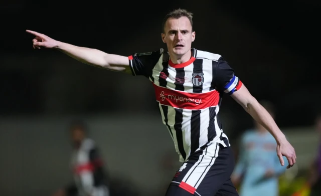 Grimsby Town's Kieran Green in action points