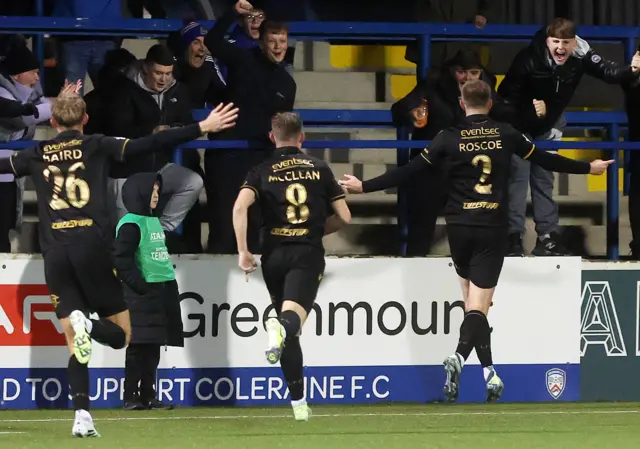 Sam Roscoe celebrates