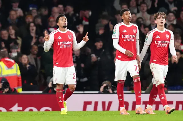 Arsenal's Ethan Nwaneri (left) celebrates scoring their side's first goal during the Carabao Cup fourth round match at Emirates Stadium, London.