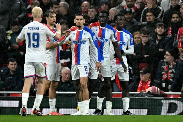 Crystal Palace's Senegalese midfielder #07 Ismaila Sarr (2R) reacts