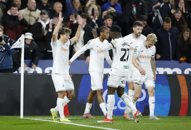 Swansea City's Goncalo Franco celebrates scoring their first goal with teammates