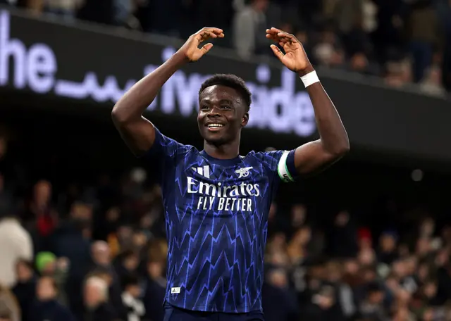 Bukayo Saka celebrates