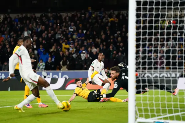 Chelsea's Tyrique George (left) scores their side's second goal of the game