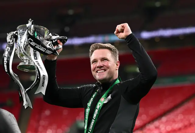 Newcastle manager Eddie Howe lifting the Carabao Cup