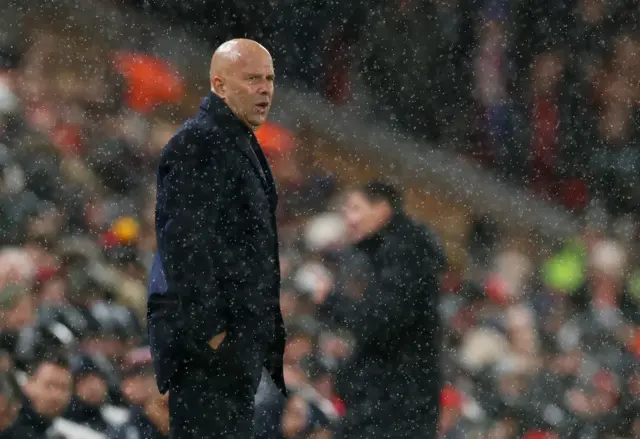 Liverpool manager Arne Slot looks on