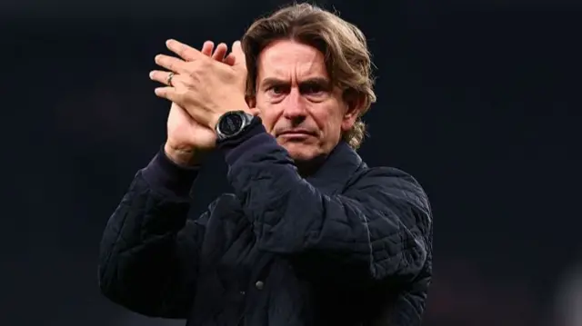 Thomas Frank clapping