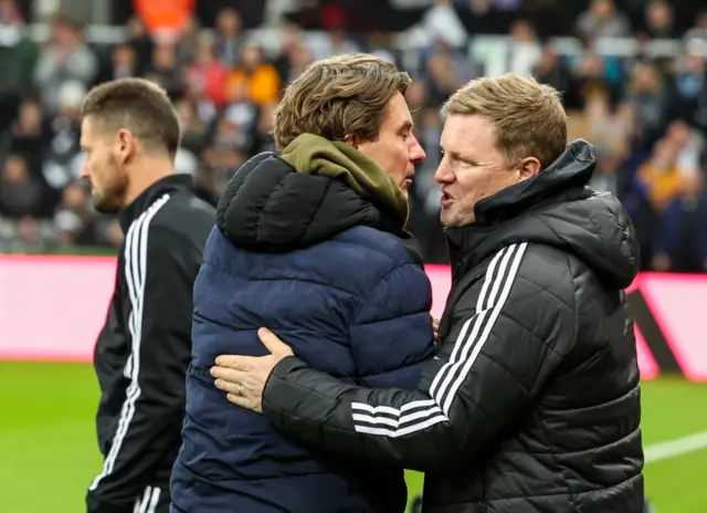 Thomas Frank shaking hands with Eddie Howe