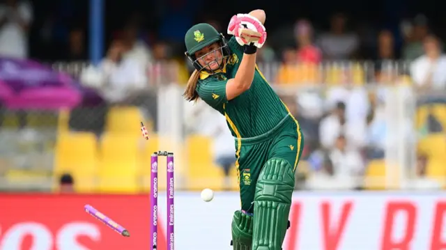Sune Luus of South Africa is bowled out by Lauren Bell