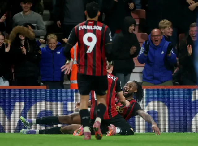 Semenyo is mobbed by teammates after scoring the third goal