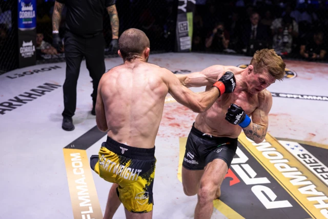 Jack Cartwright punches Caolan Loughran in the face