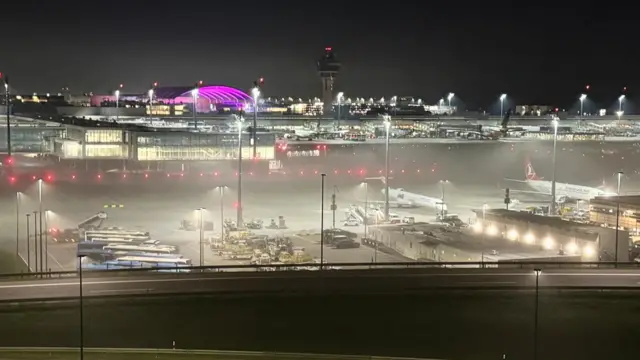 A night-time shot of Munich Airport which closed early last night due to drone disruption