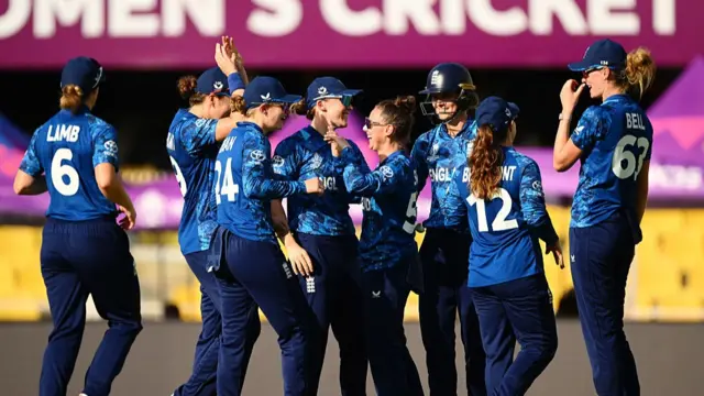 Linsey Smith of England celebrates with team mates