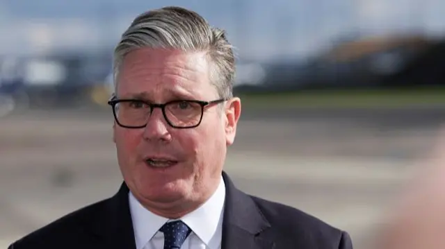 Prime Minister Keir Starmer gives a statement on some tarmac