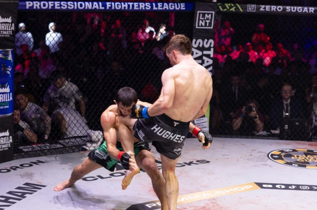 Paul Hughes knees Usman Nurmagomedov