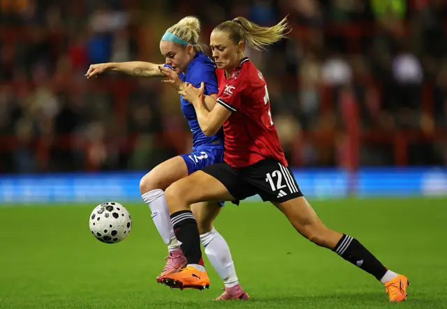 Ellie Carpenter of Chelsea battles for possession with Fridolina Rolfo