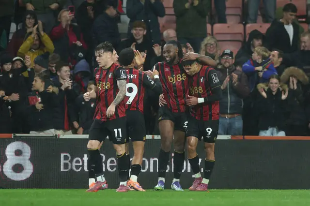 Semenyo is mobbed by teammates after scoring the third goal