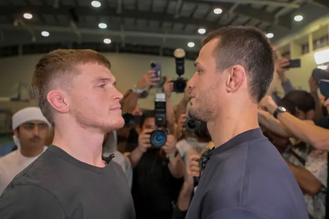Paul Hughes facing off with Usman Nurmagomedov