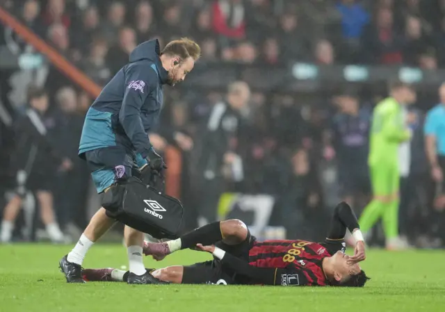 Evanilson lies stricken on the floor