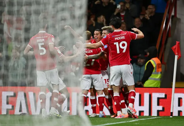Wrexham players celebrate their goal