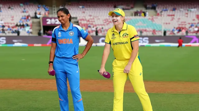 Harmanpreet Kaur of India and Alyssa Healy of Australia