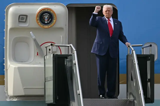 Trump puts up his fist