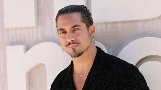 Mike Marino poses on the red carpet