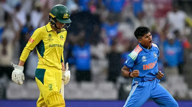 India's Kranti Goud (R) celebrates