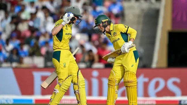 Australia's Phoebe Litchfield (R) celebrates with teammate Ellyse Perry