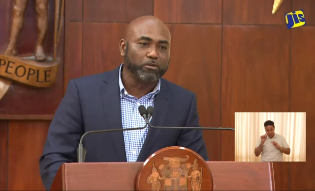 Minister Andrew O'Brien Wheatley.