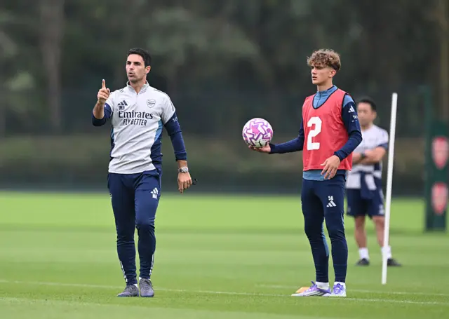 Mikel Arteta and Max Dowman