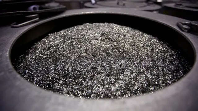 Annealed neodymium iron boron magnets sit in a barrel prior to being crushed into powder at Neo Material Technologies Inc.'s Magnequench Tianjin Co. factory in Tianjin, China, on Friday, June 11, 20