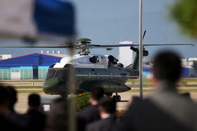 Marine One lands at Gimahe International Airport