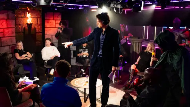 Greg James points to someone at the Radio 1 round table.