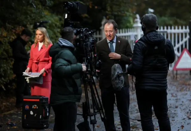 Members of the media working outside the entrance to Royal Lodge, a large property on the estate surrounding Windsor Castle. Former prince Andrew has been given notice to leave the property as the Royal Family distances itself from him over his links to convicted sex offender Jeffrey Epstein.