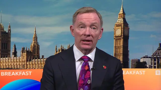 Chris Bryant pictured in the BBC Breakfast studio with am image of Westminster in the background