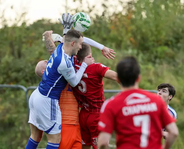 Aaron McCarey battling for the ball